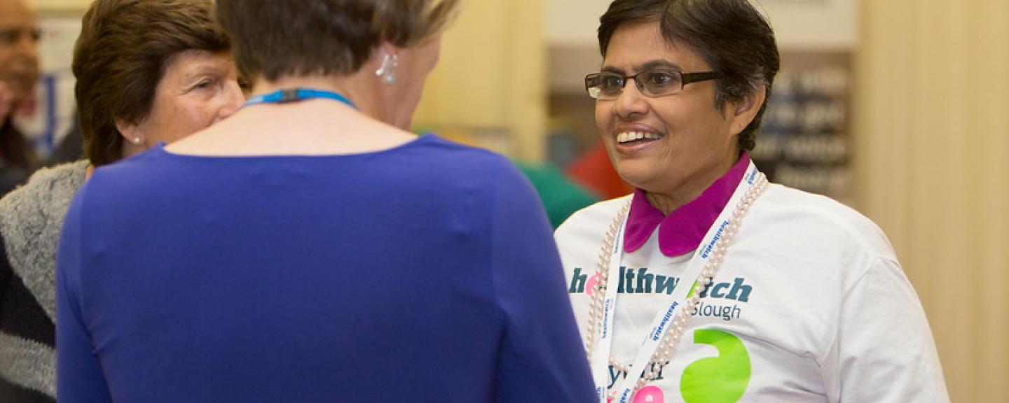 Healthwatch volunteer talking to a member of the public